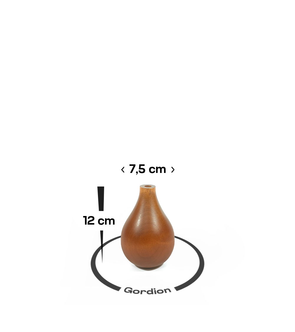 Gordion Ahşap Aksesuar Ceviz 12 cm. Lavi Tasarım Ahşap aksesuar Gordion, evinize doğanın huzurunu taşırken, ceviz ahşap dekor ürünü, zarif dokusuyla kalite ve şıklığı bir arada sunuyor.